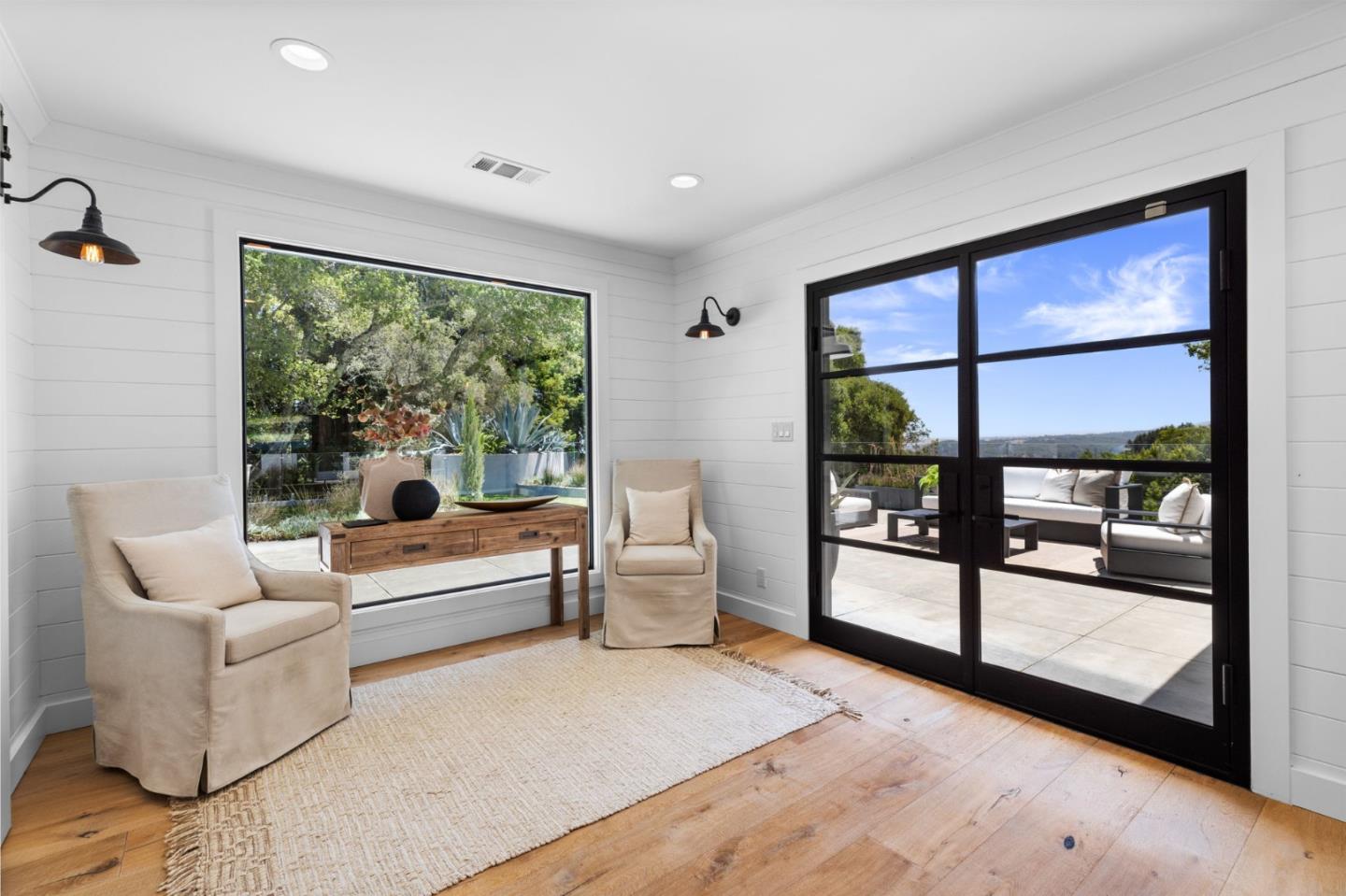 595 Summit Spring Road Woodside, CA 94062 - Photo 4 of 56 a living room with furniture and a large window