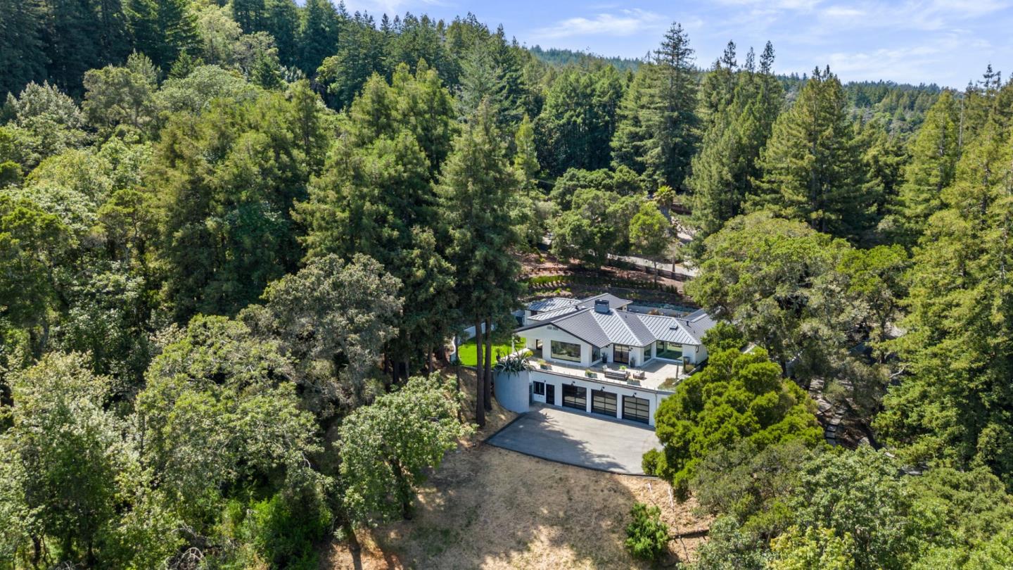 595 Summit Spring Road Woodside, CA 94062 - Photo 54 of 56 an aerial view of a house with a yard