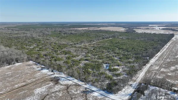 a view of a yard with an ocean beach