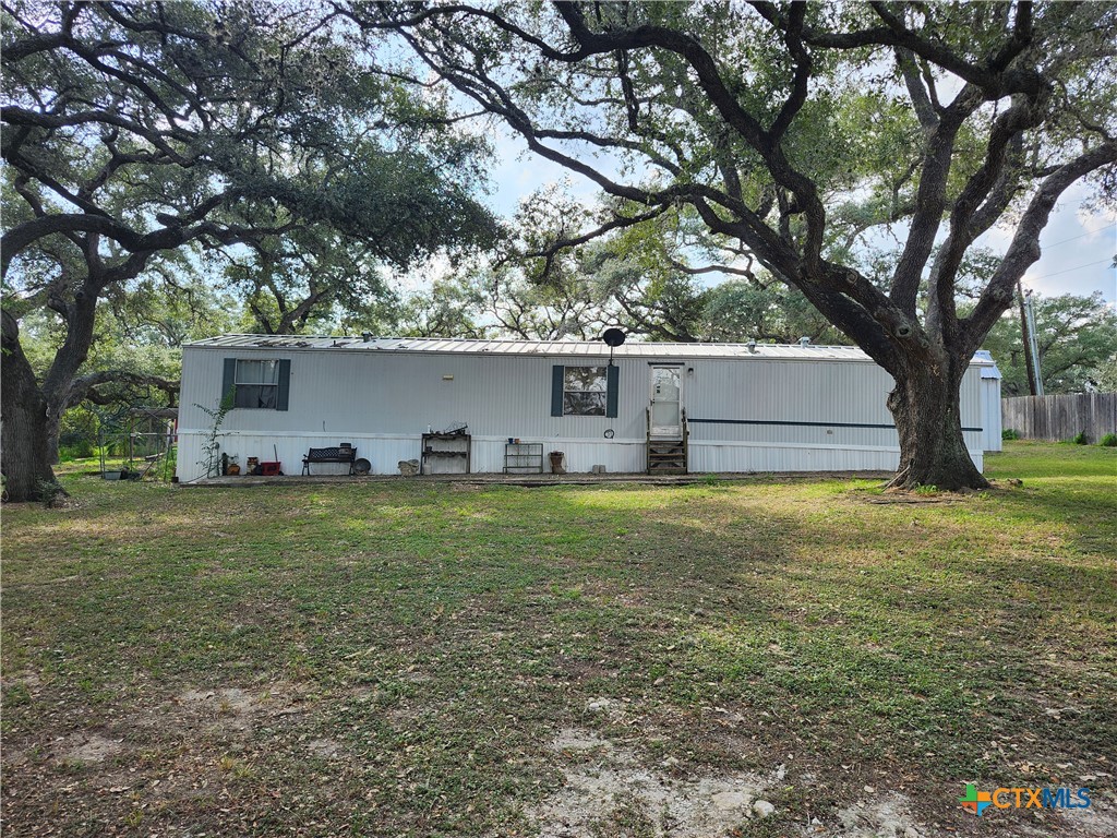 96 Reeves Ranch Road Victoria, TX 77905 - Photo 2 of 16 a view of a house with a yard