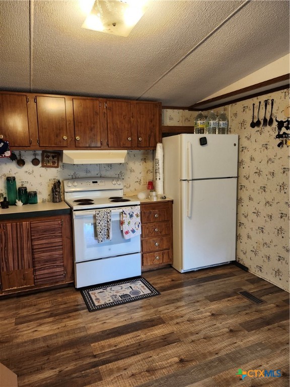 96 Reeves Ranch Road Victoria, TX 77905 - Photo 5 of 16 a kitchen with stainless steel appliances granite countertop a refrigerator stove and sink