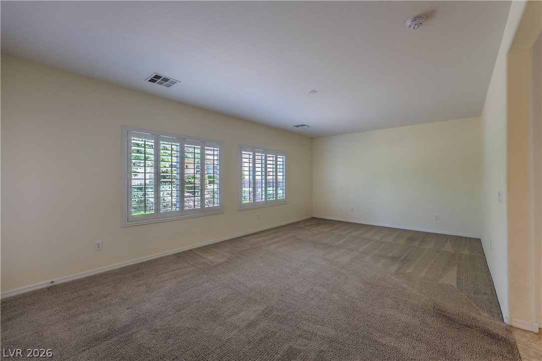 2276 Saxtons River Road Henderson, NV 89044 - Photo 16 of 49 Owner's Suite with Walk-In Closet, and Door to Back Patio