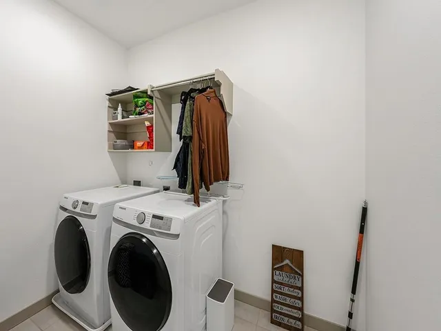 a view of hallway with washer and dryer