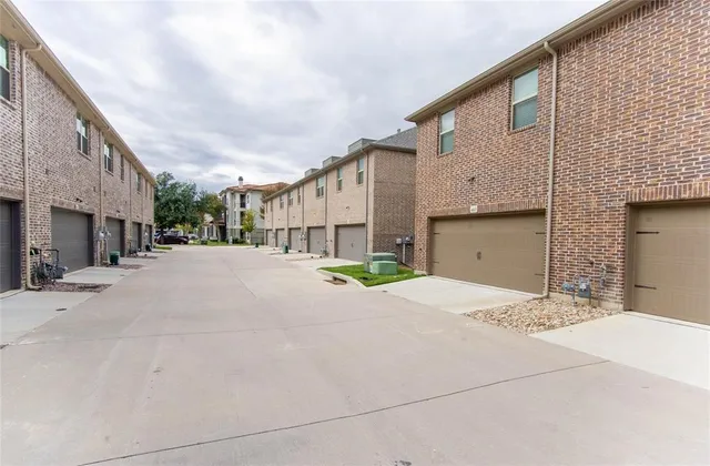 a view of a house with a street