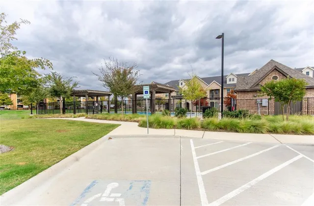 a view of a garden with a fountain
