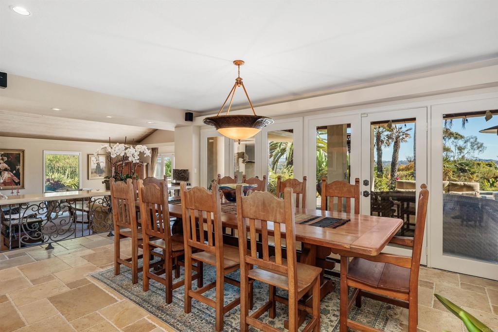 16346 Via Del Alba Rancho Santa Fe, CA 92067 - Photo 4 of 34 a view of a dining room with furniture window and wooden floor