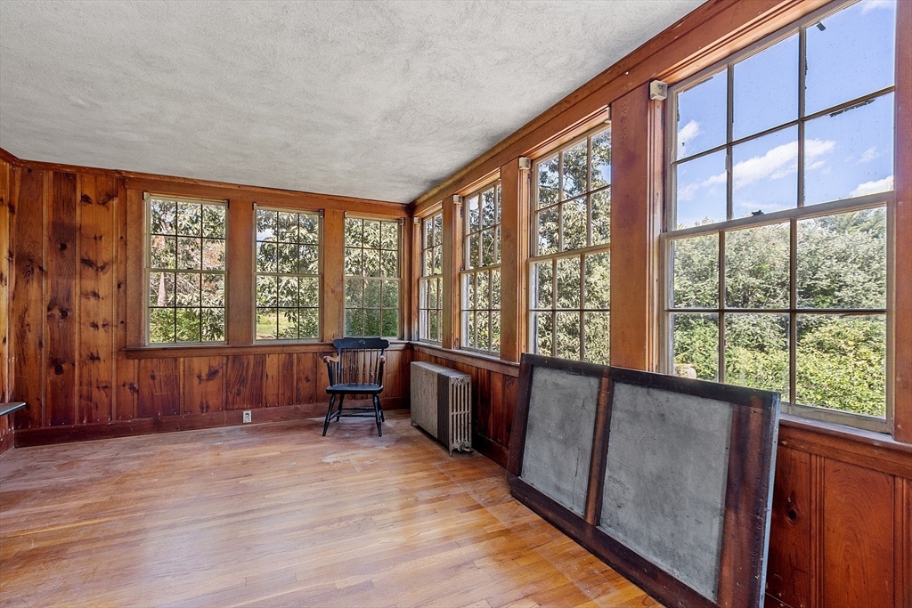129 Oak Hill Road Harvard, MA 01451 - Photo 13 of 24 a large living room with a large window