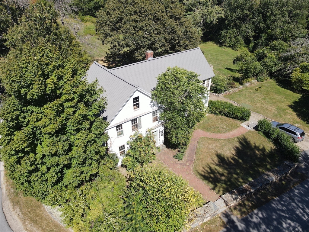129 Oak Hill Road Harvard, MA 01451 - Photo 2 of 24 an aerial view of a house with a yard and trees