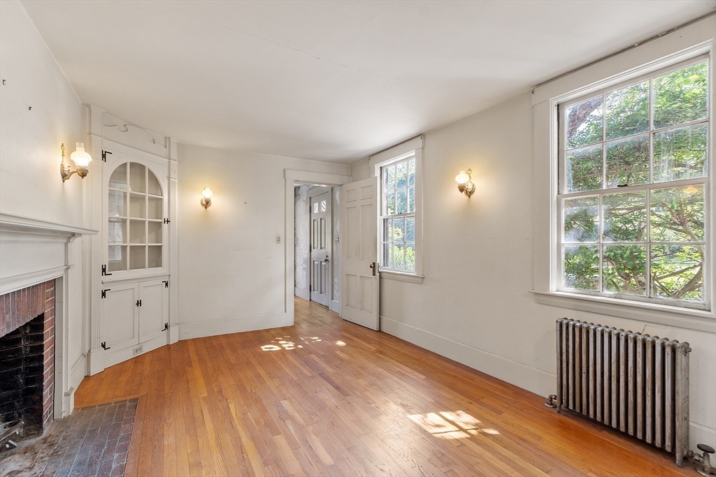 129 Oak Hill Road Harvard, MA 01451 - Photo 5 of 24 a view of empty room with wooden floor and fan
