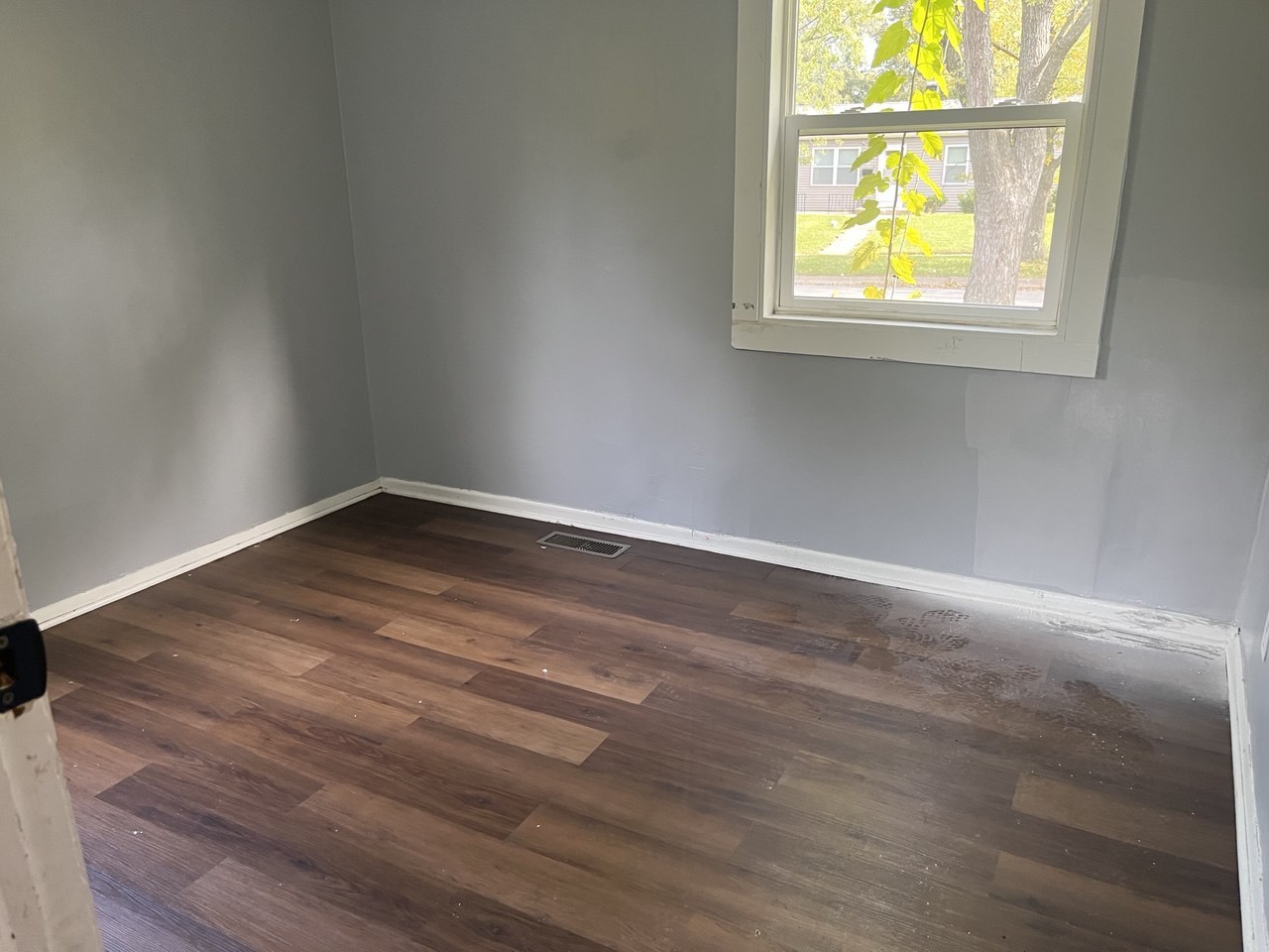 22146 Yates Avenue Sauk Village, IL 60411 - Photo 6 of 10 an empty room with a window