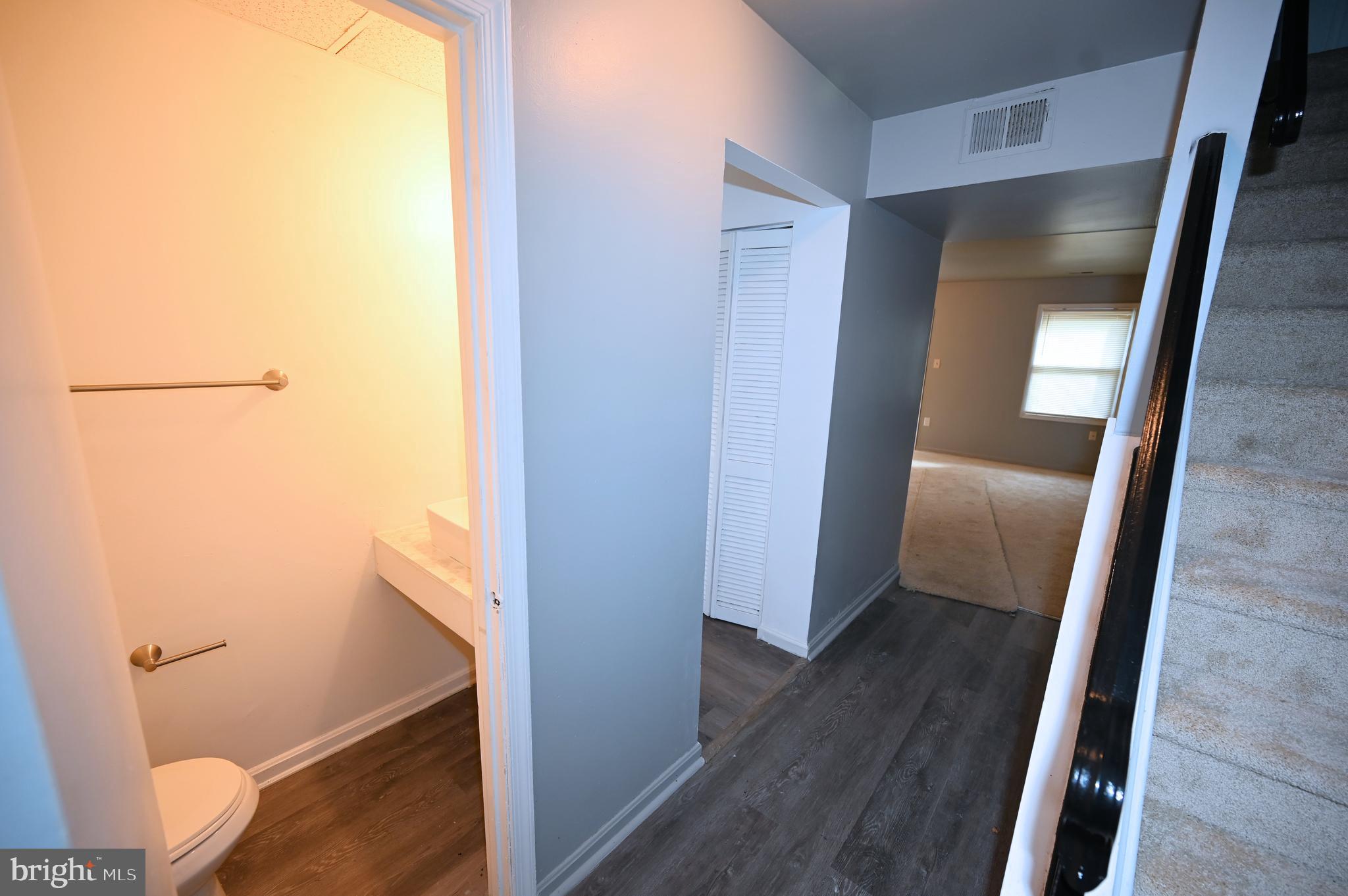 2223 Anvil Lane Temple Hills, MD 20748 - Photo 18 of 30 a view of a hallway with wooden floor