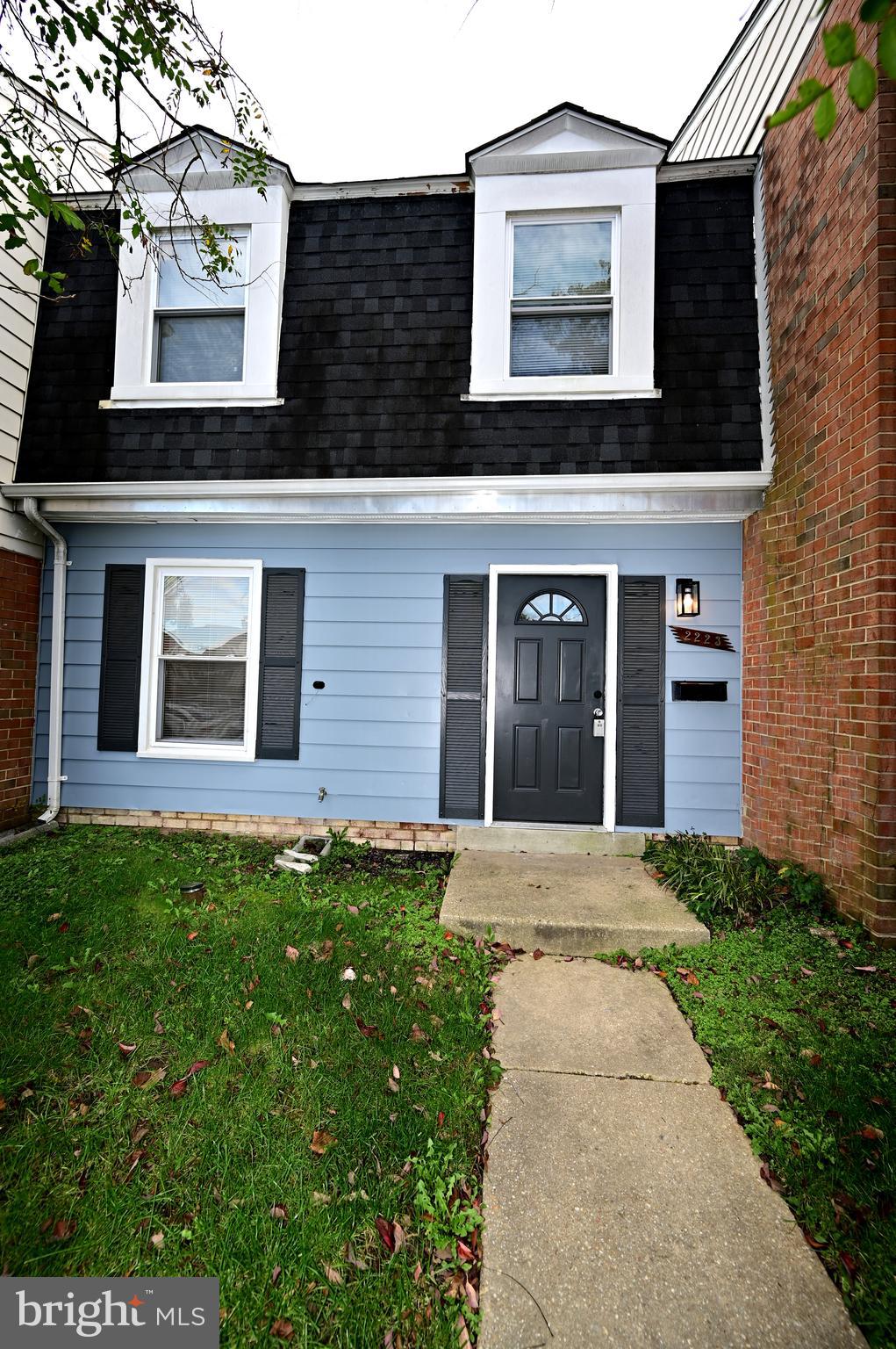 2223 Anvil Lane Temple Hills, MD 20748 - Photo 2 of 30 a front view of a house with garden