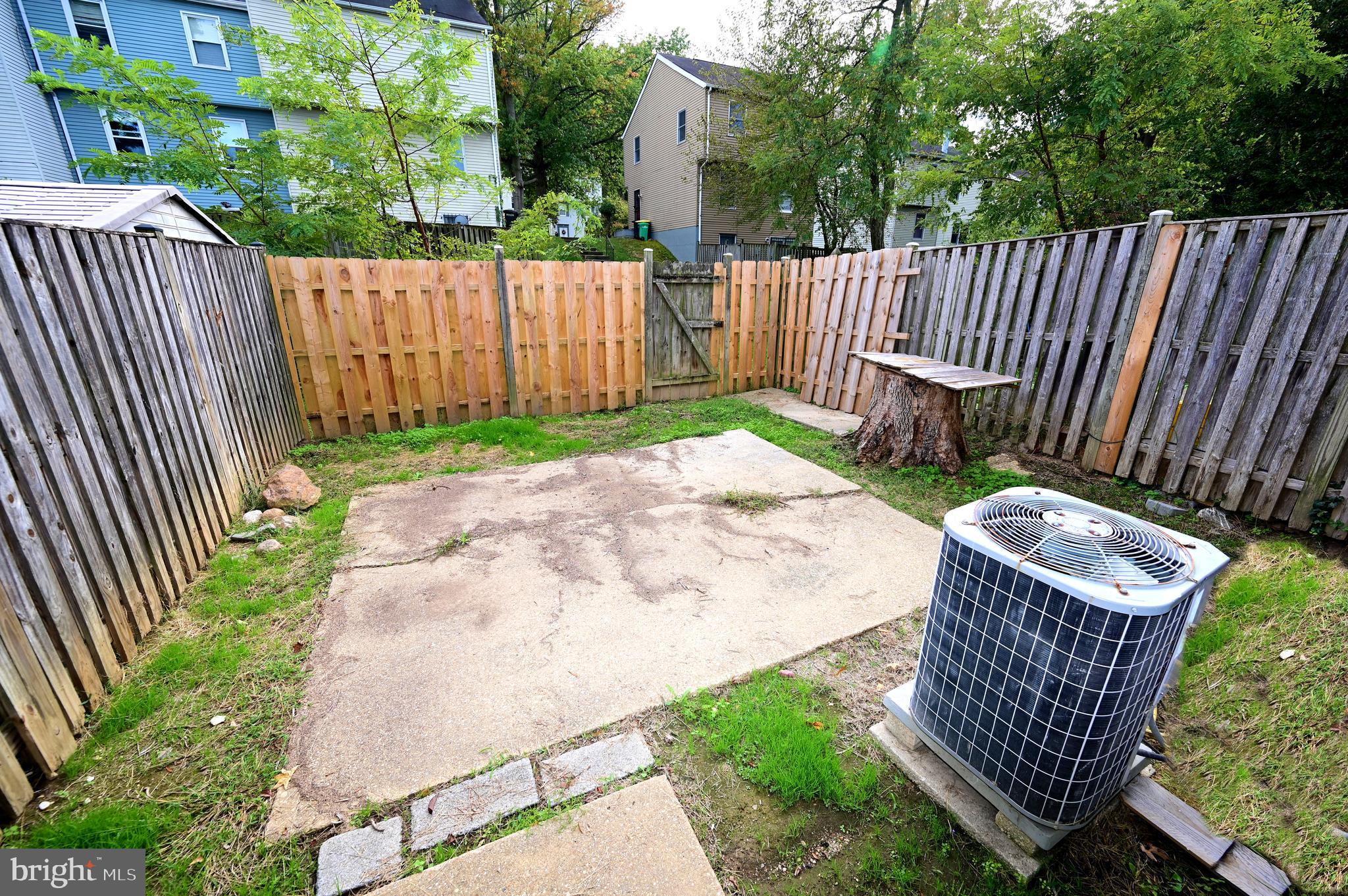 2223 Anvil Lane Temple Hills, MD 20748 - Photo 6 of 30 a garden view with wooden fence