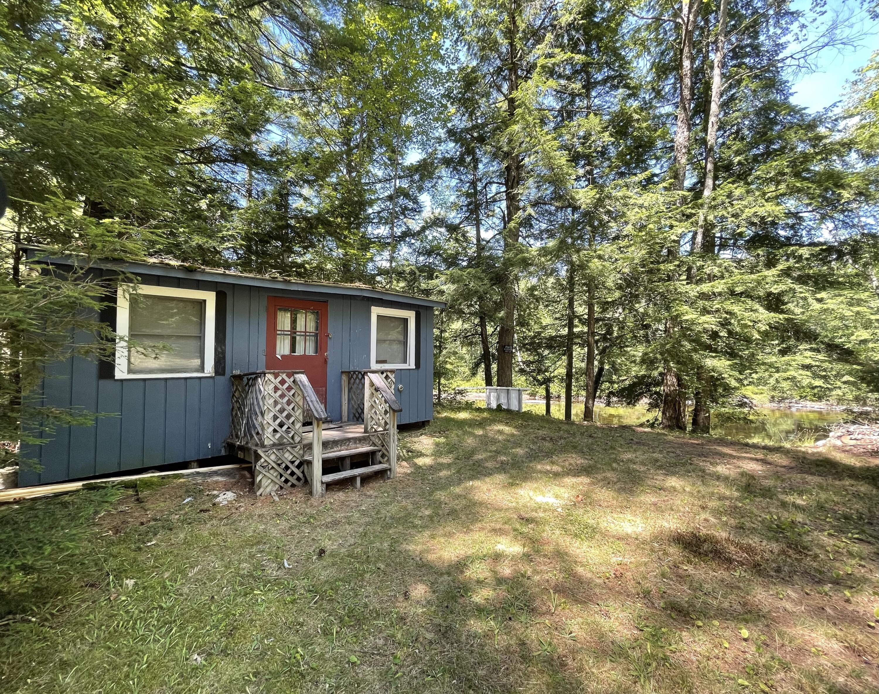 185 Sokokis Road Parsonsfield, ME 04047 - Photo 17 of 26 Bunkhouse right by the river's edge