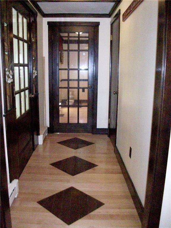 265 Songo School Road Naples, ME 04055 - Photo 5 of 18 Front Entryway with Inlaid Hardwood...