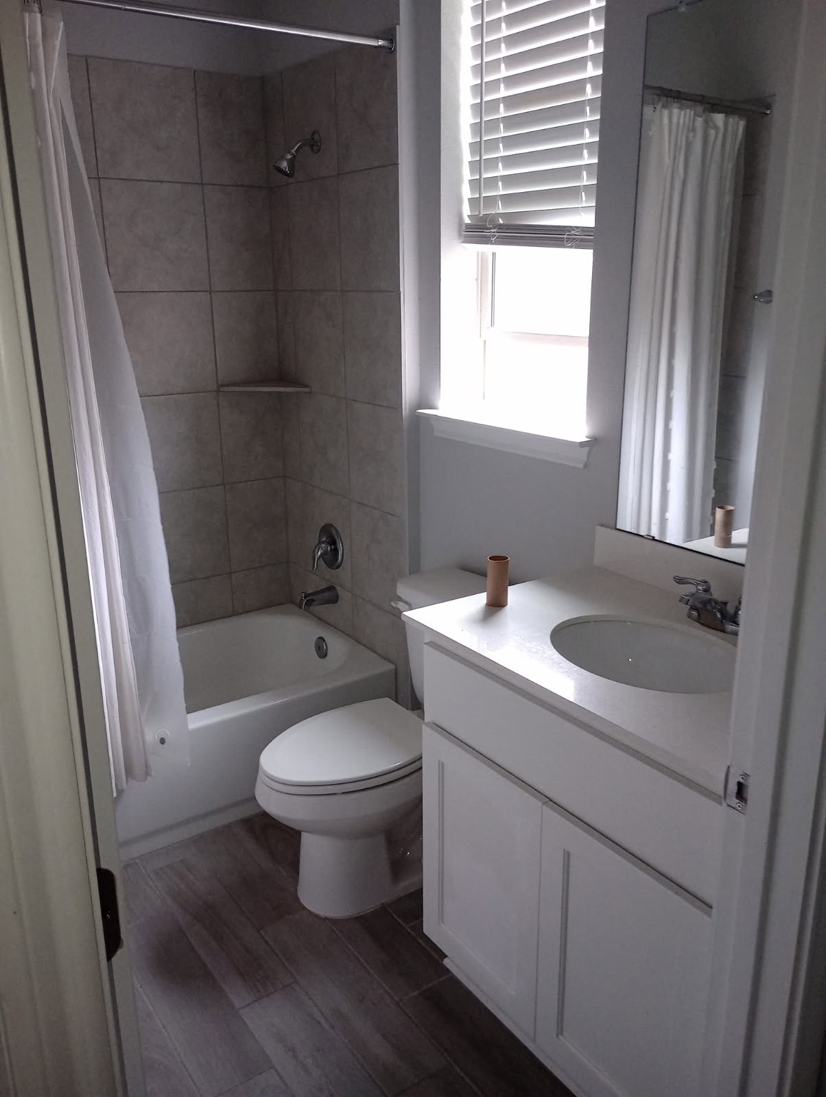 336 Mclintock Road Jarrell, TX 76537 - Photo 5 of 14 a bathroom with a sink toilet and shower