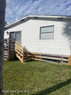 3406 Frankie Lane Cocoa, FL 32926 - Photo 2 of 14 a view of a backyard with sitting area