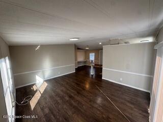 3406 Frankie Lane Cocoa, FL 32926 - Photo 4 of 14 a view of gallery with wooden floor