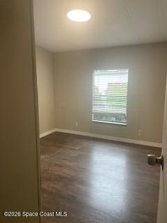 3406 Frankie Lane Cocoa, FL 32926 - Photo 10 of 14 an empty room with wooden floor and windows