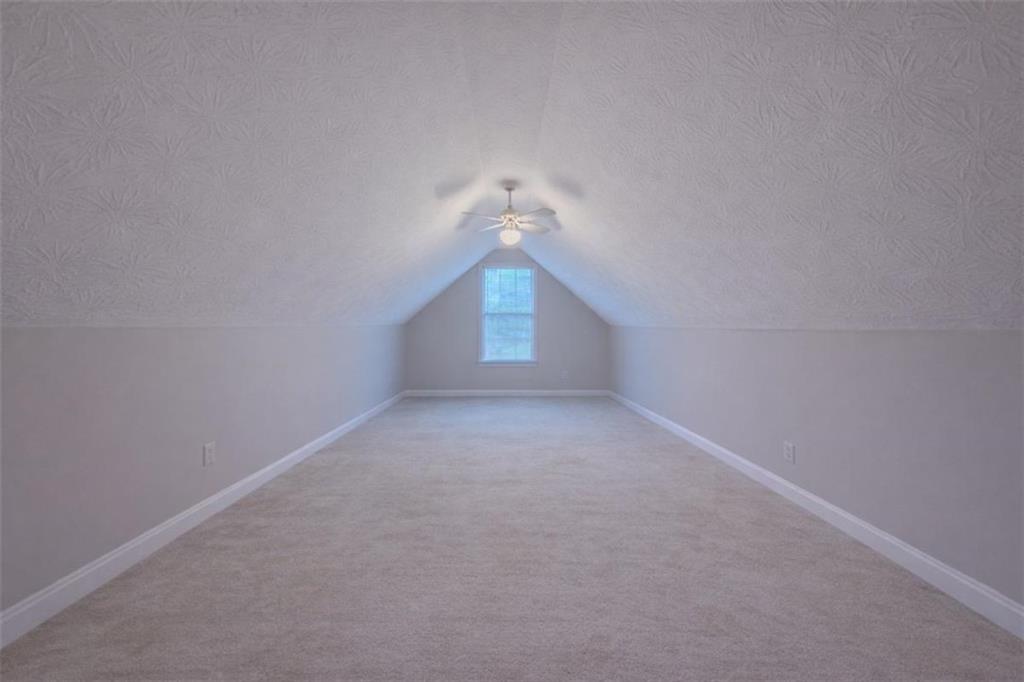 30 Cinnamon Fern Circle Covington, GA 30016 - Photo 18 of 27 a view of a window in an empty room