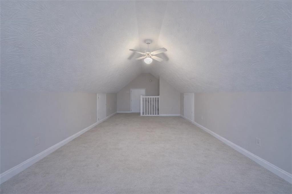 30 Cinnamon Fern Circle Covington, GA 30016 - Photo 20 of 27 a view of an empty room