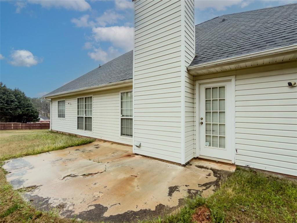 30 Cinnamon Fern Circle Covington, GA 30016 - Photo 21 of 27 a front view of a house