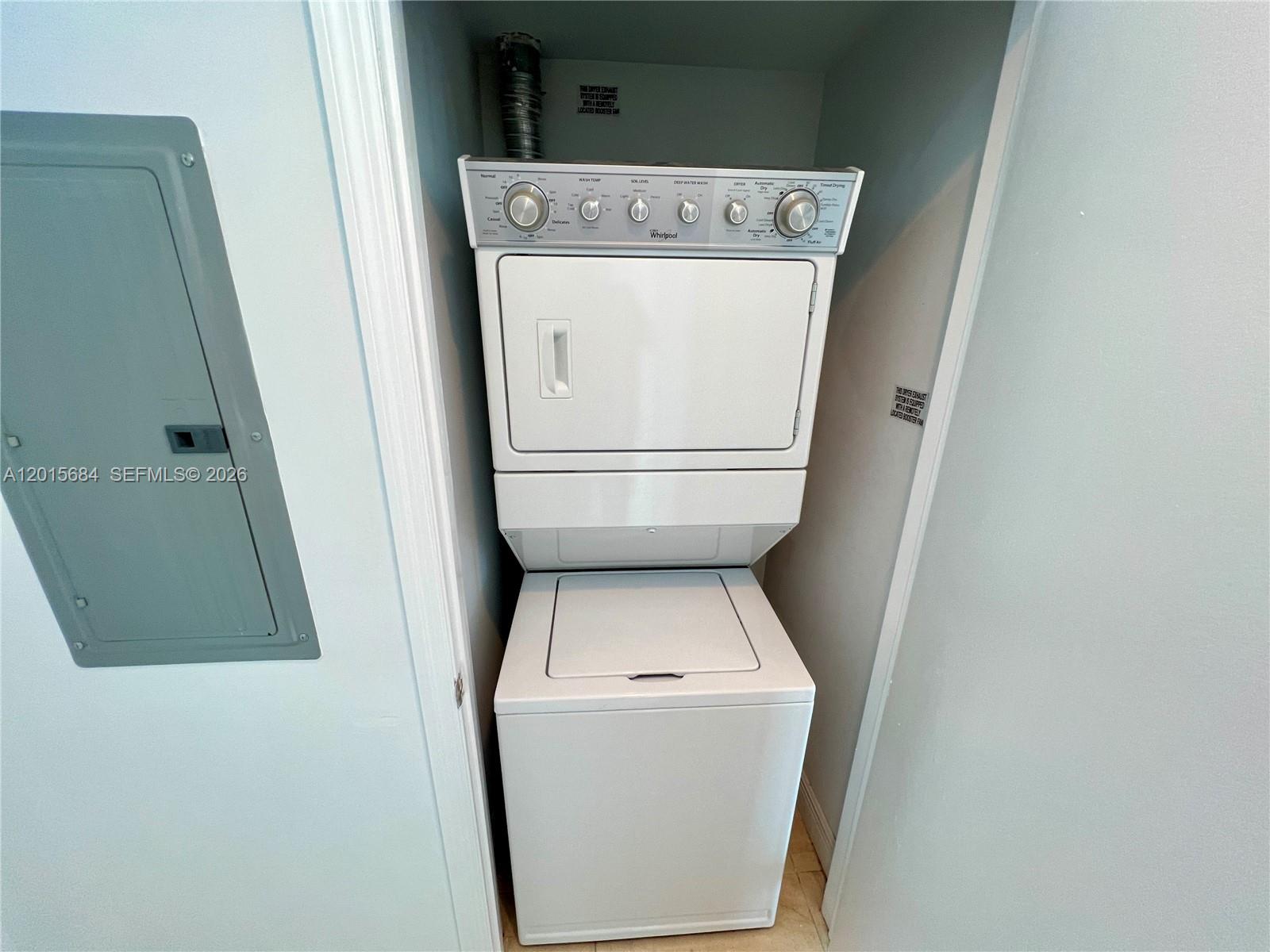 60 Southwest 13th Street, Unit 3609 Miami, FL 33130 - Photo 11 of 24 a utility room with dryer and washer