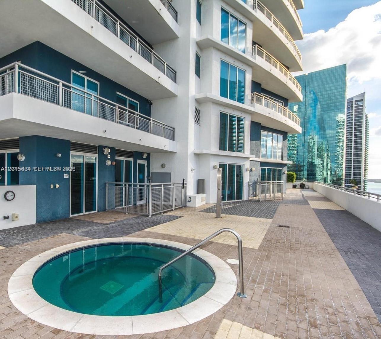 60 Southwest 13th Street, Unit 3609 Miami, FL 33130 - Photo 15 of 24 a view of building with outdoor space