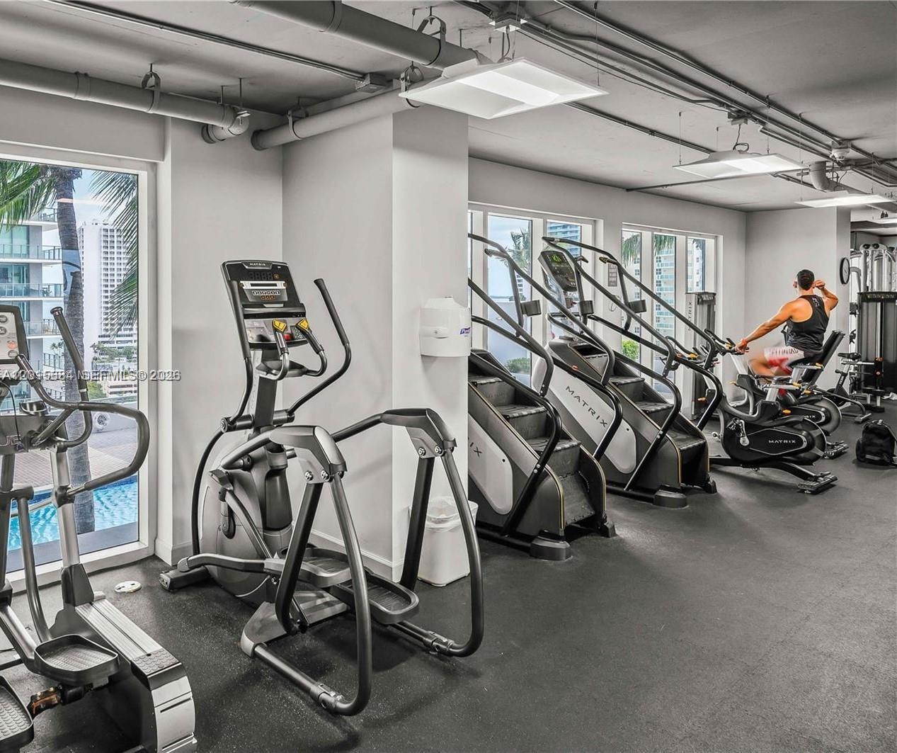 60 Southwest 13th Street, Unit 3609 Miami, FL 33130 - Photo 17 of 24 a view of a room with gym equipment