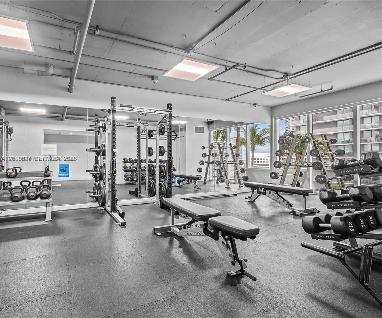 60 Southwest 13th Street, Unit 3609 Miami, FL 33130 - Photo 21 of 24 a view of a room with gym equipment