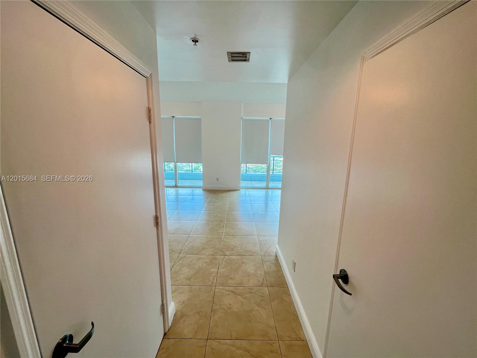 60 Southwest 13th Street, Unit 3609 Miami, FL 33130 - Photo 5 of 24 a bathroom with a sink and shower