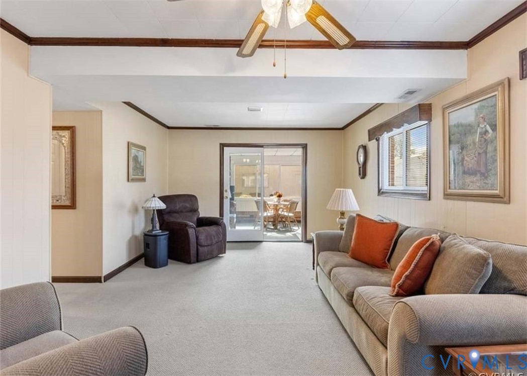 9003 Hungary Road Henrico, VA 23294 - Photo 21 of 25 Wall-to-wall carpeting and exposed ceiling beams