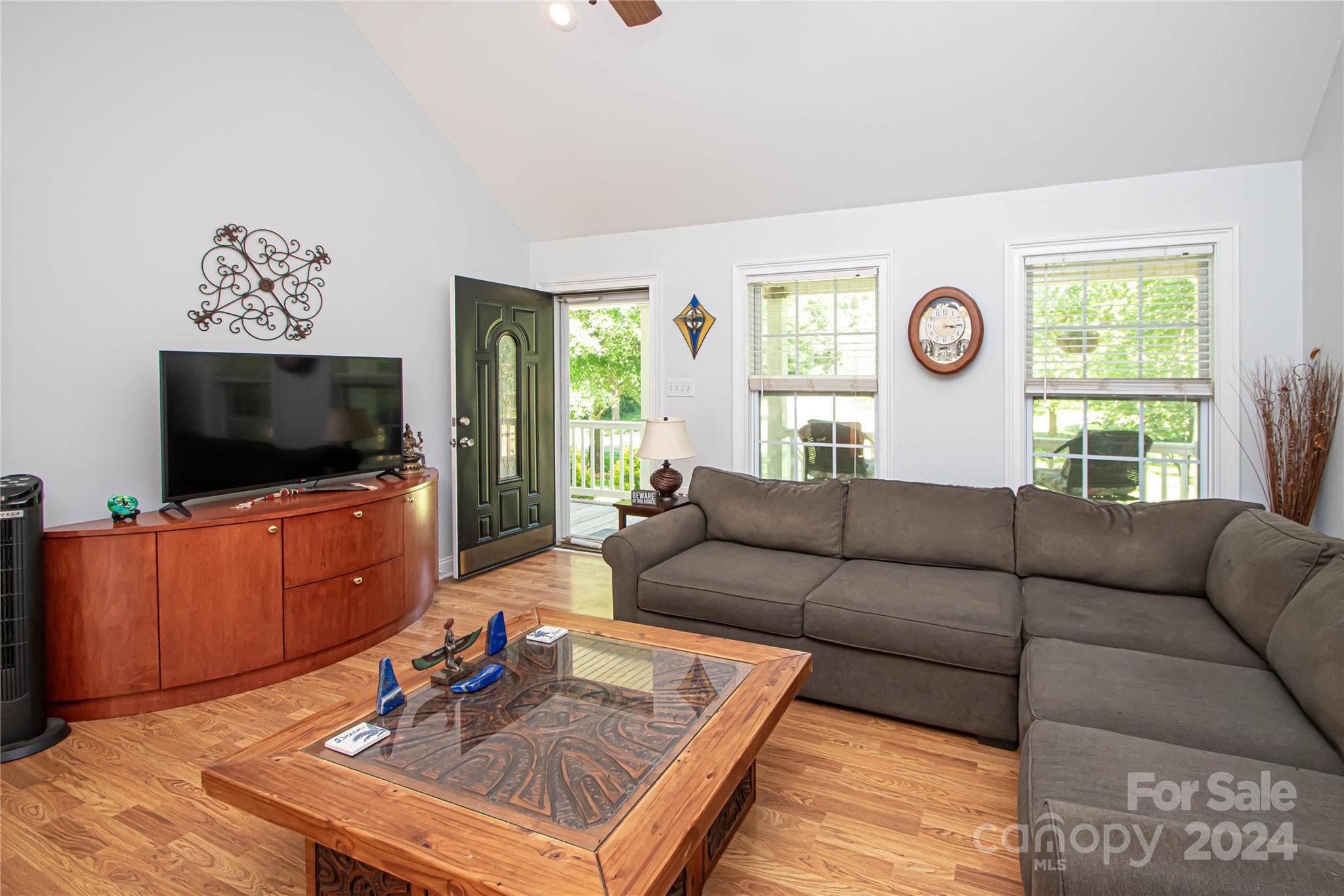 1641 Logan Terry Road Lancaster, SC 29720 - Photo 17 of 45 a living room with furniture and a flat screen tv