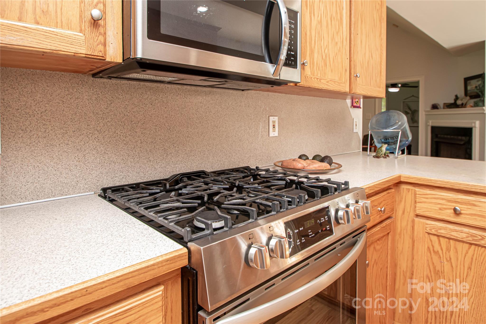1641 Logan Terry Road Lancaster, SC 29720 - Photo 27 of 45 a stove top oven sitting inside of a kitchen