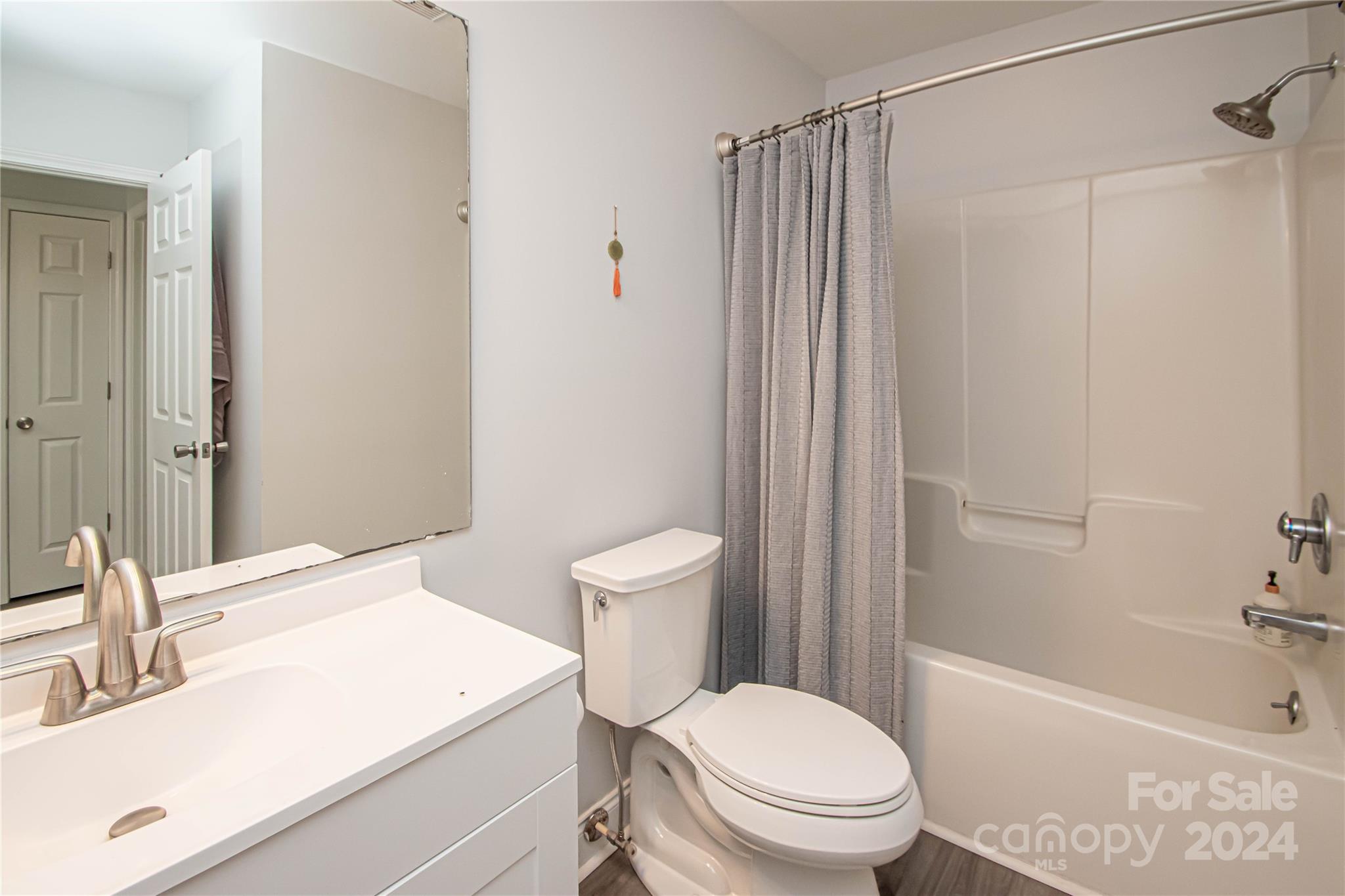 1641 Logan Terry Road Lancaster, SC 29720 - Photo 42 of 45 a white toilet sitting next to a bathroom sink