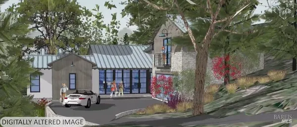 a view of a houses with a lush green hillside