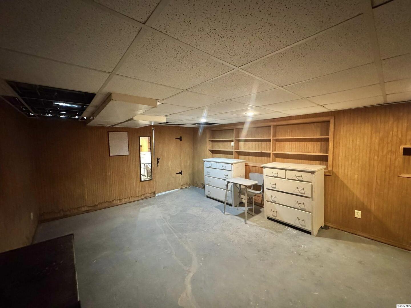 608 Adams Street Quincy, IL 62301 - Photo 14 of 19 a view of a room with storage space