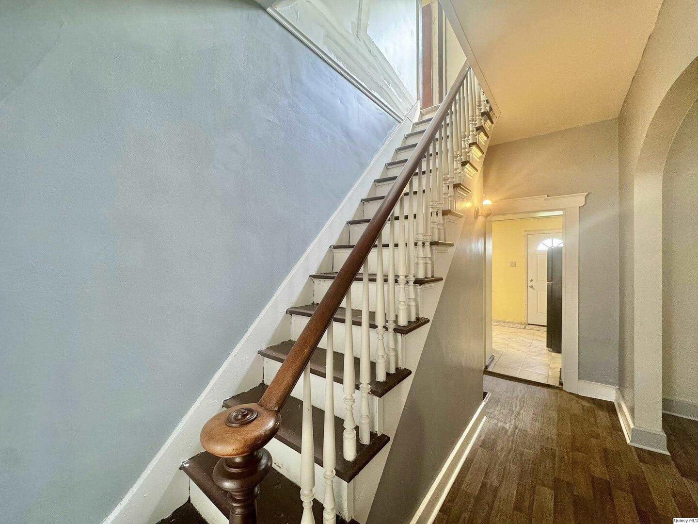 608 Adams Street Quincy, IL 62301 - Photo 8 of 19 a view of entryway with wooden floor
