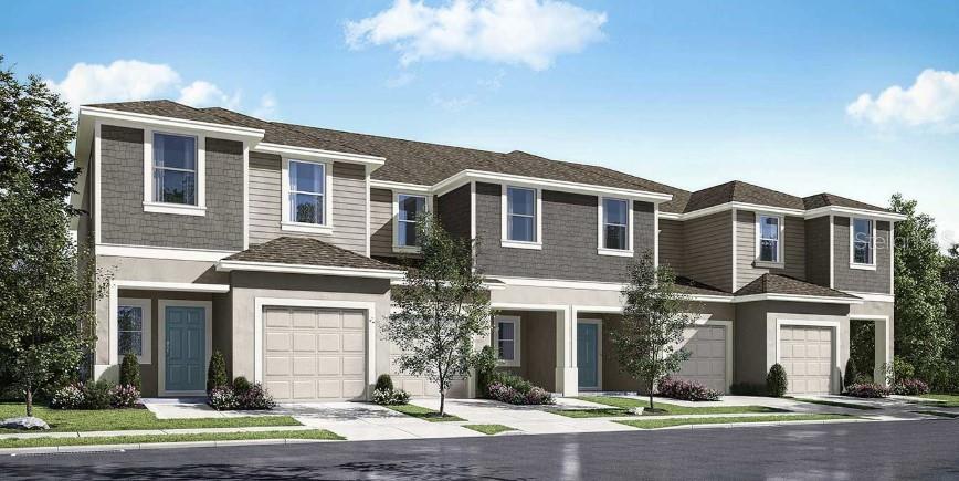 2075 Hallier Cove Wesley Chapel, FL 33543 - Photo 1 of 1 a front view of a house with a yard
