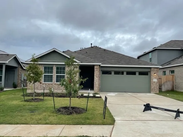 a front view of house with yard