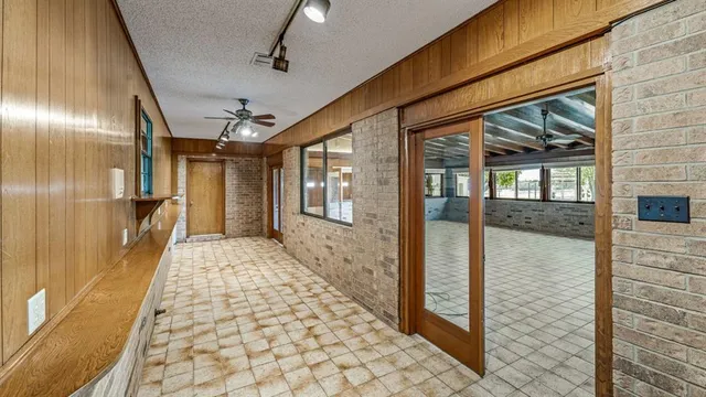 a bathroom with a glass door shower