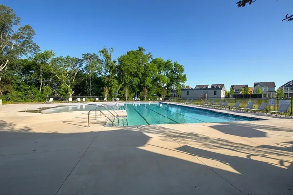 a view of swimming pool with a yard