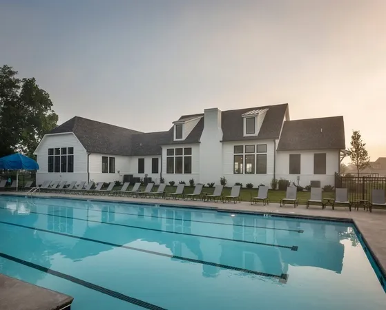 a front view of house with yard and outdoor seating