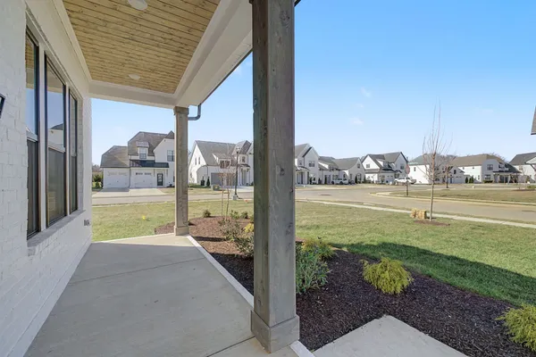 a kitchen with a sink and refrigerator