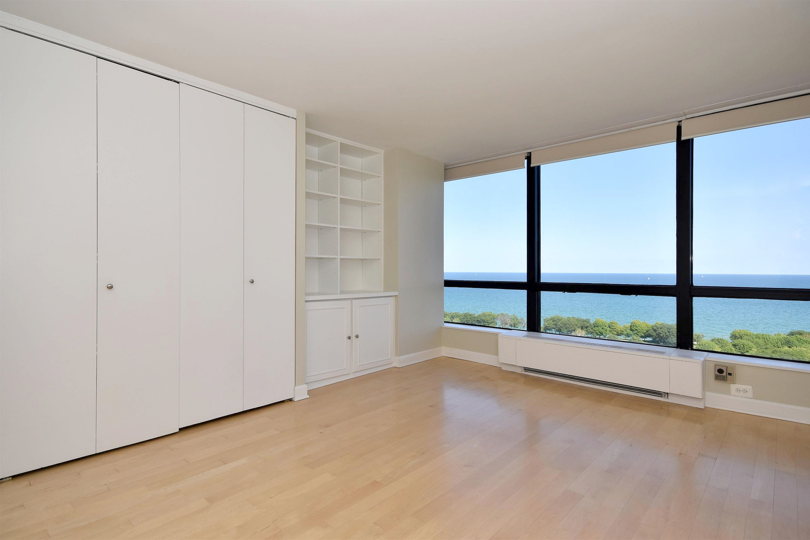 5415 North Sheridan Road, Unit 1806 Chicago, IL 60640 - Photo 17 of 38 a view of an empty room with a window