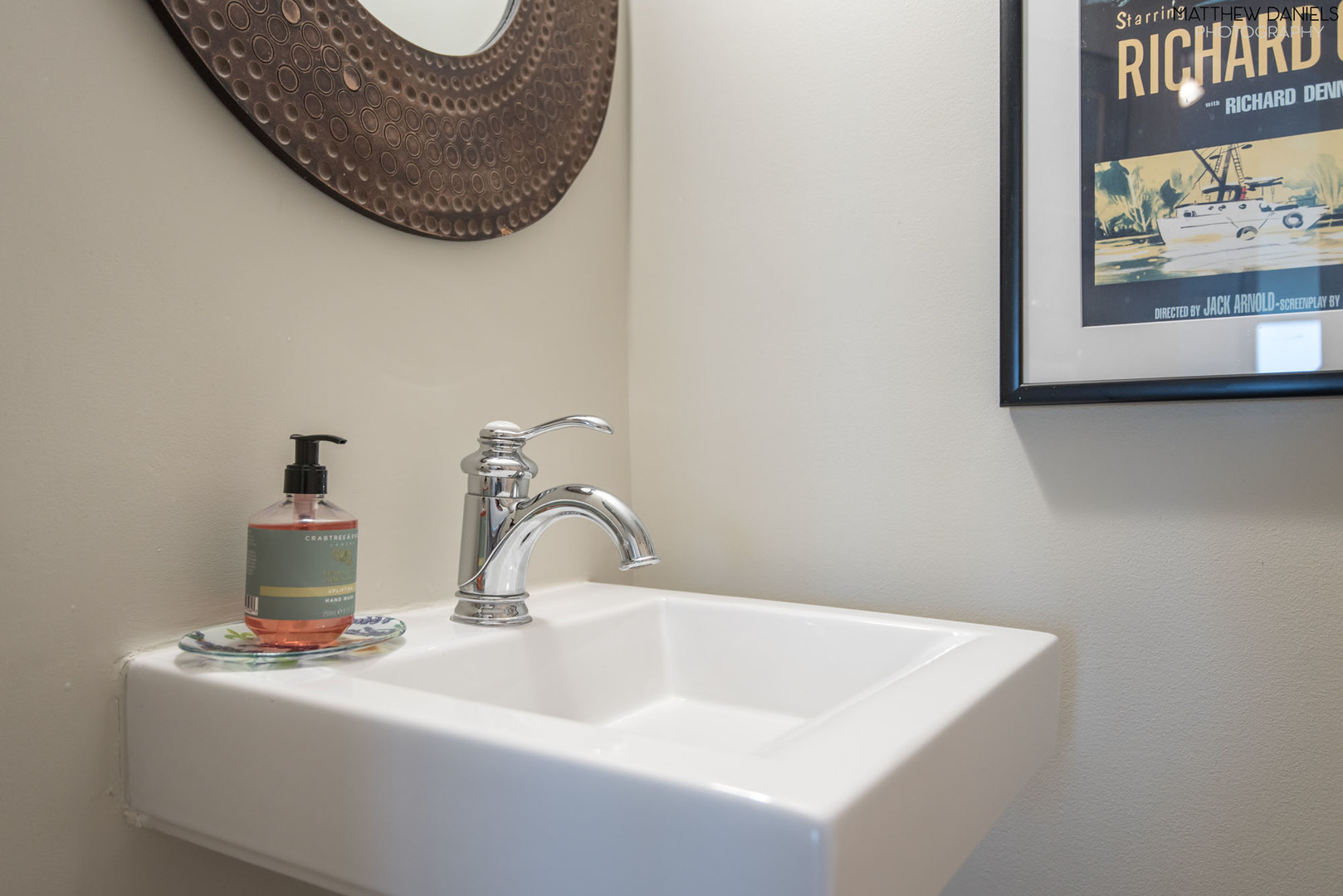 5415 North Sheridan Road, Unit 1806 Chicago, IL 60640 - Photo 26 of 38 a bathroom with a sink and a mirror