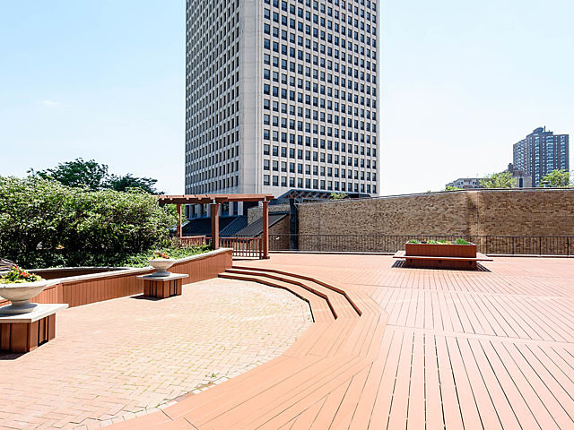 5415 North Sheridan Road, Unit 1806 Chicago, IL 60640 - Photo 29 of 38 a view of a swimming pool with a lounge chairs