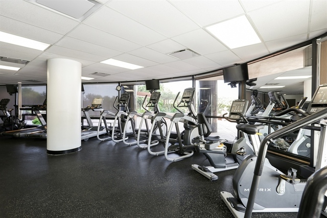 5415 North Sheridan Road, Unit 1806 Chicago, IL 60640 - Photo 30 of 38 a view of a room with gym equipment