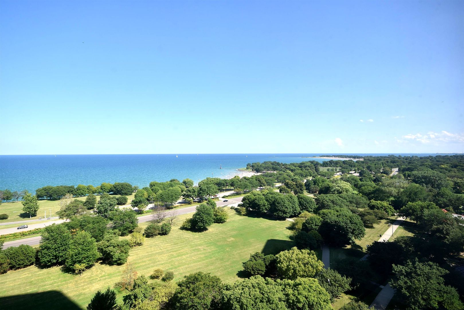 5415 North Sheridan Road, Unit 1806 Chicago, IL 60640 - Photo 8 of 38 an aerial view of a houses with a yard