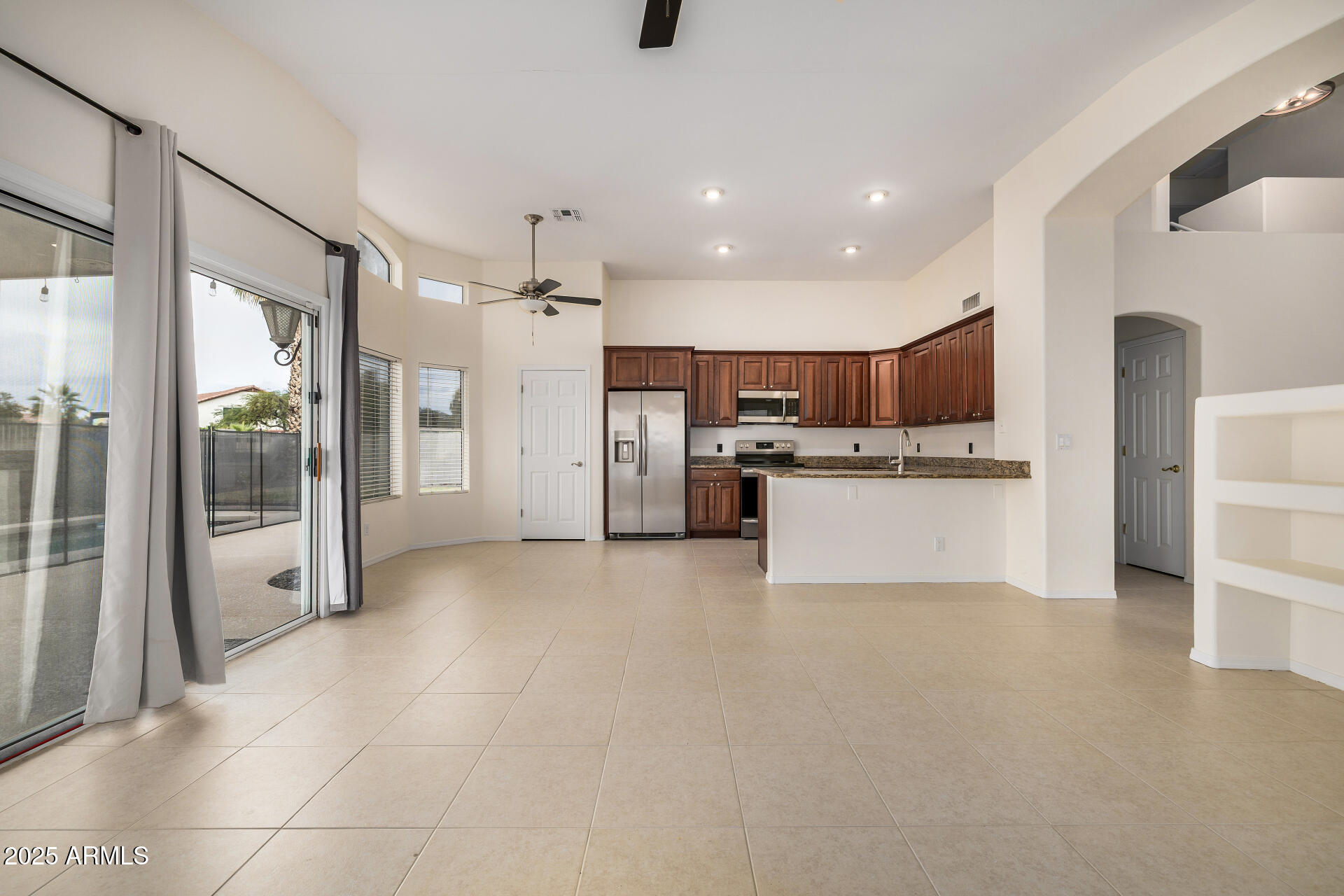 15002 South 47th Street Phoenix, AZ 85044 - Photo 13 of 41 a view of a kitchen with refrigerator and a sink